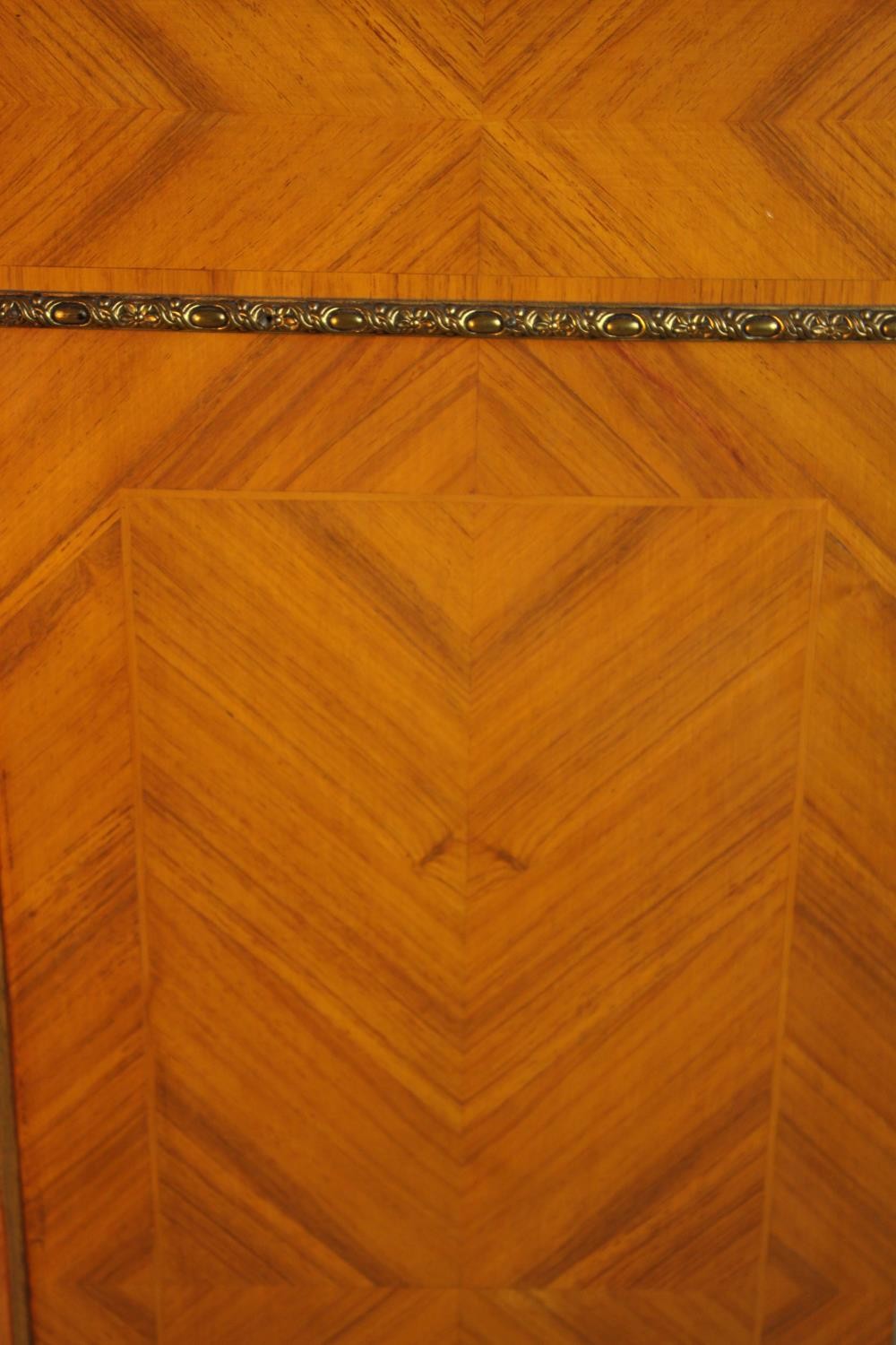An 20th century French inlaid single door cabinet raised on shaped bracket feet, applied - Image 9 of 9
