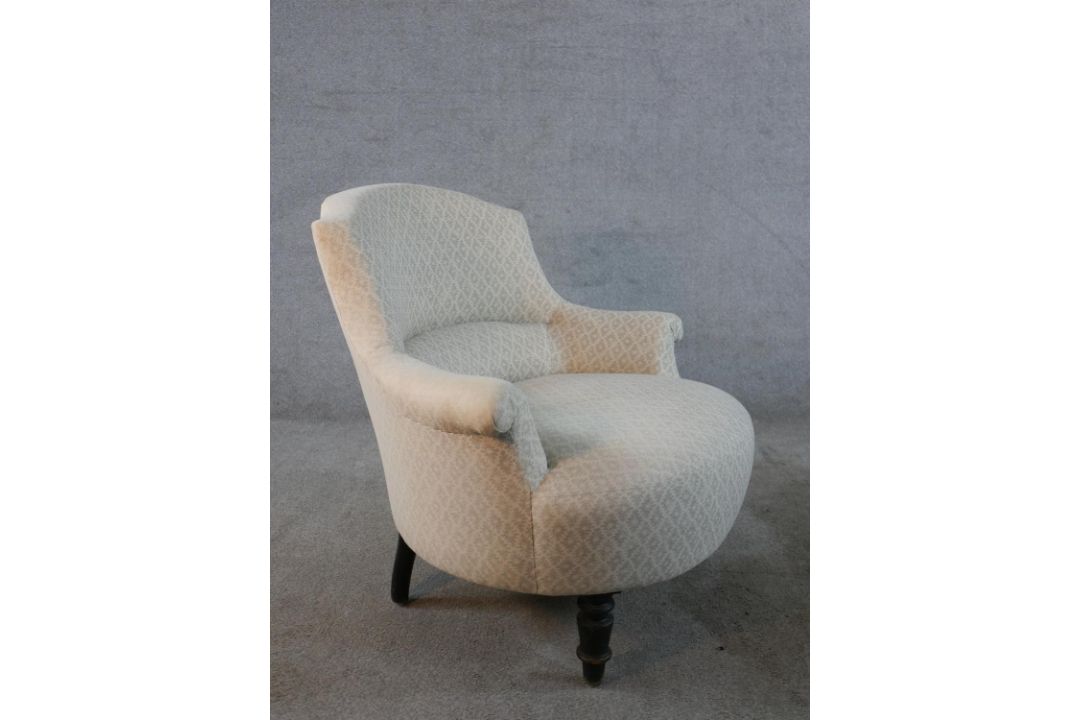 A 19th century mahogany framed nursing chair, upholstered in cream Dralon fabric raised on turned - Image 4 of 4