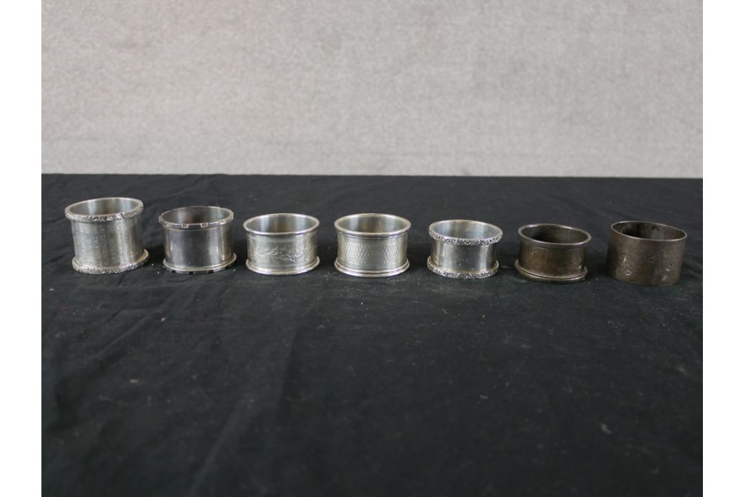 Seven assorted hallmarked silver napkin rings to include Coopers Brothers, Sheffield 1974; Joseph - Image 1 of 11