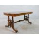 A 19th century walnut veneered centre table raised on two turned columns raised on outswept supports - Image 4 of 4
