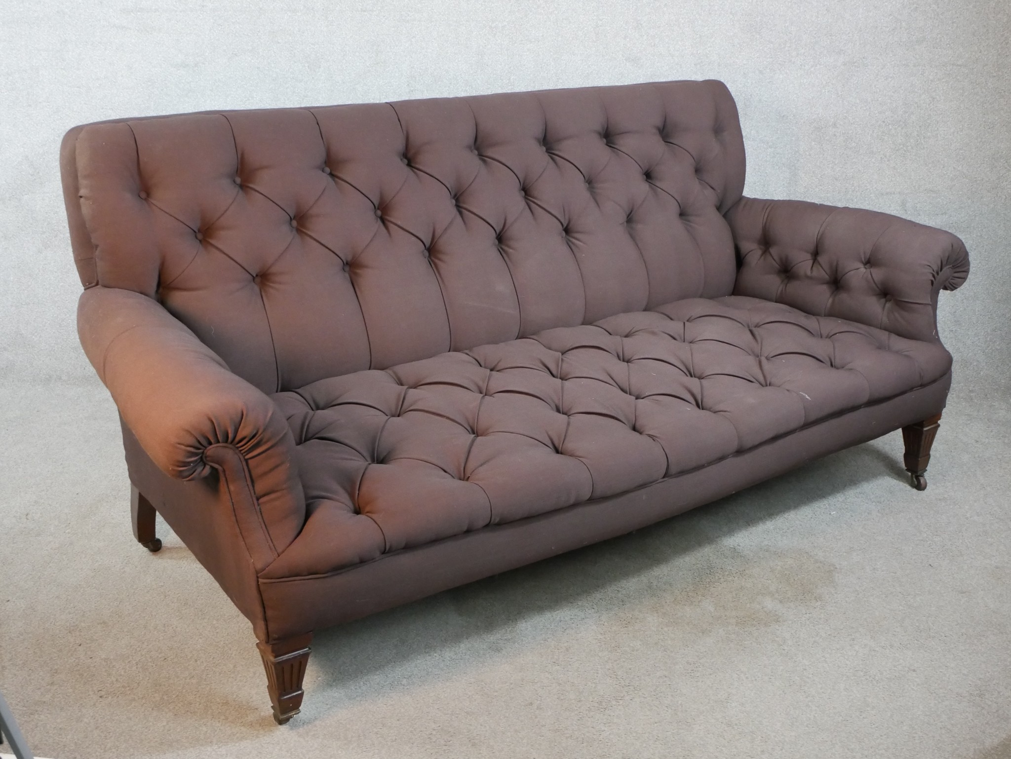 A late 19th century mahogany framed button upholstered scroll arm settee, raised on square - Image 4 of 5