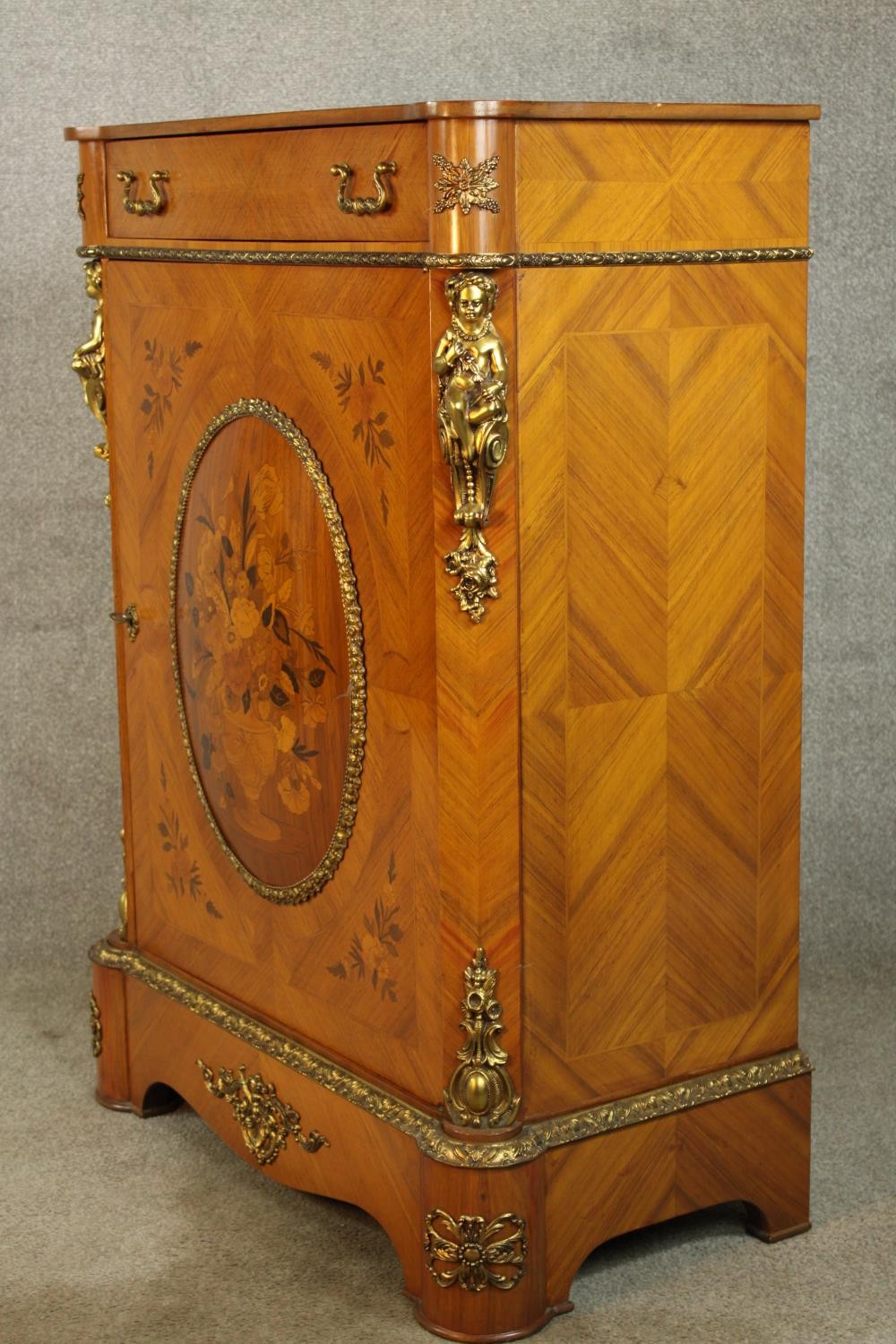 An 20th century French inlaid single door cabinet raised on shaped bracket feet, applied - Image 3 of 9