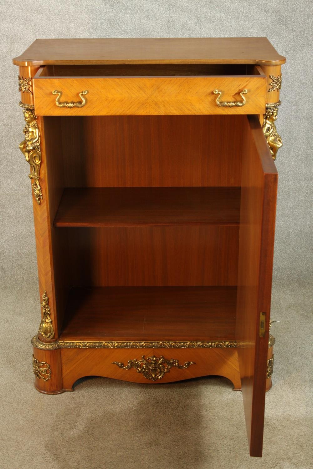 An 20th century French inlaid single door cabinet raised on shaped bracket feet, applied - Image 8 of 9