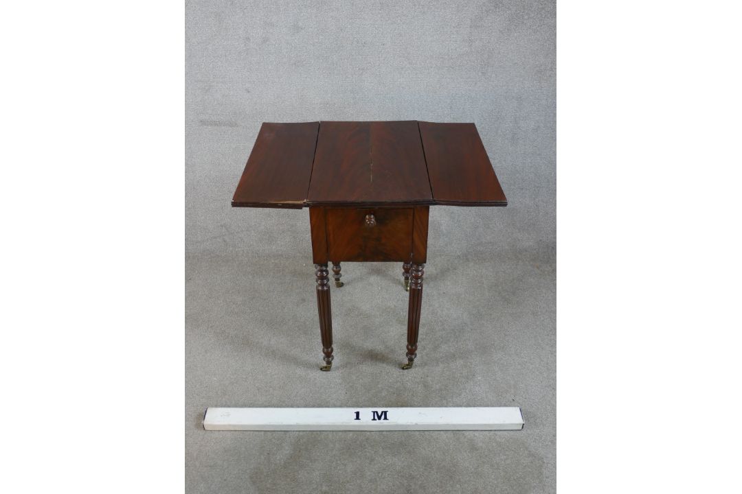A 19th century mahogany drop leaf sewing table, with twin drawers to one end, raised on turned - Image 6 of 6