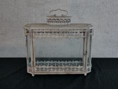 A contemporary painted metal and glass storm lantern, with carrying handle. H.51 W.48 D.13cm