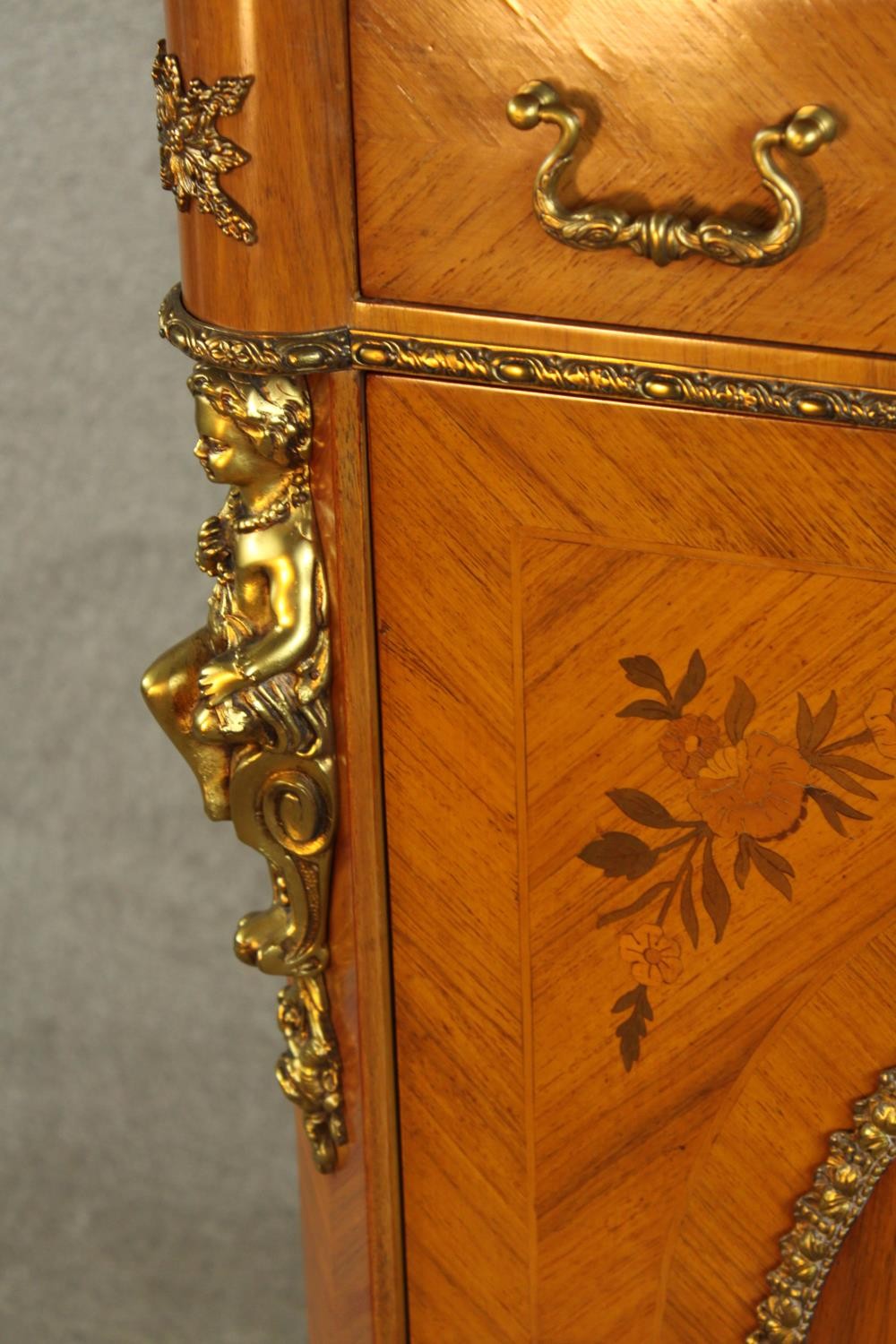 An 20th century French inlaid single door cabinet raised on shaped bracket feet, applied - Image 7 of 9