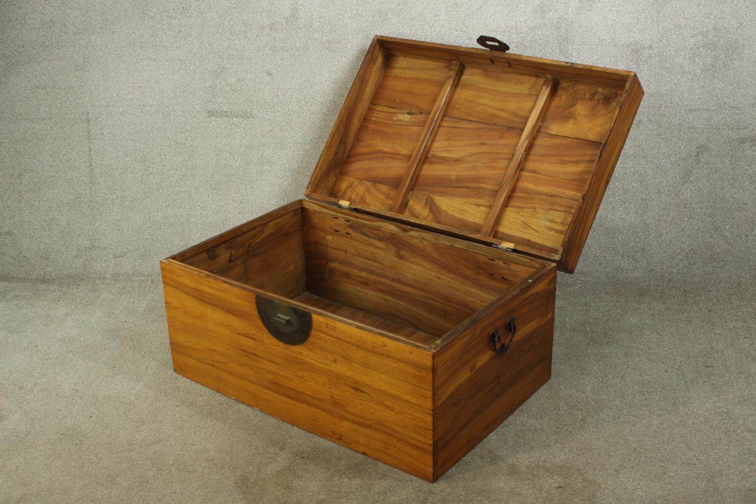 An early 20th century Chinese camphor wood twin handled box, with brass locking plate. H.46 W.91 D. - Image 4 of 6