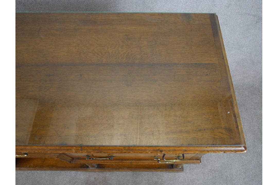 A 20th century oak five drawer sideboard with brass swing handles, raised on turned support with - Image 4 of 8
