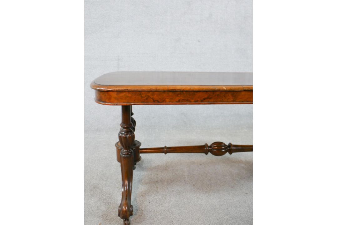 A 19th century walnut veneered centre table raised on two turned columns raised on outswept supports - Image 3 of 4