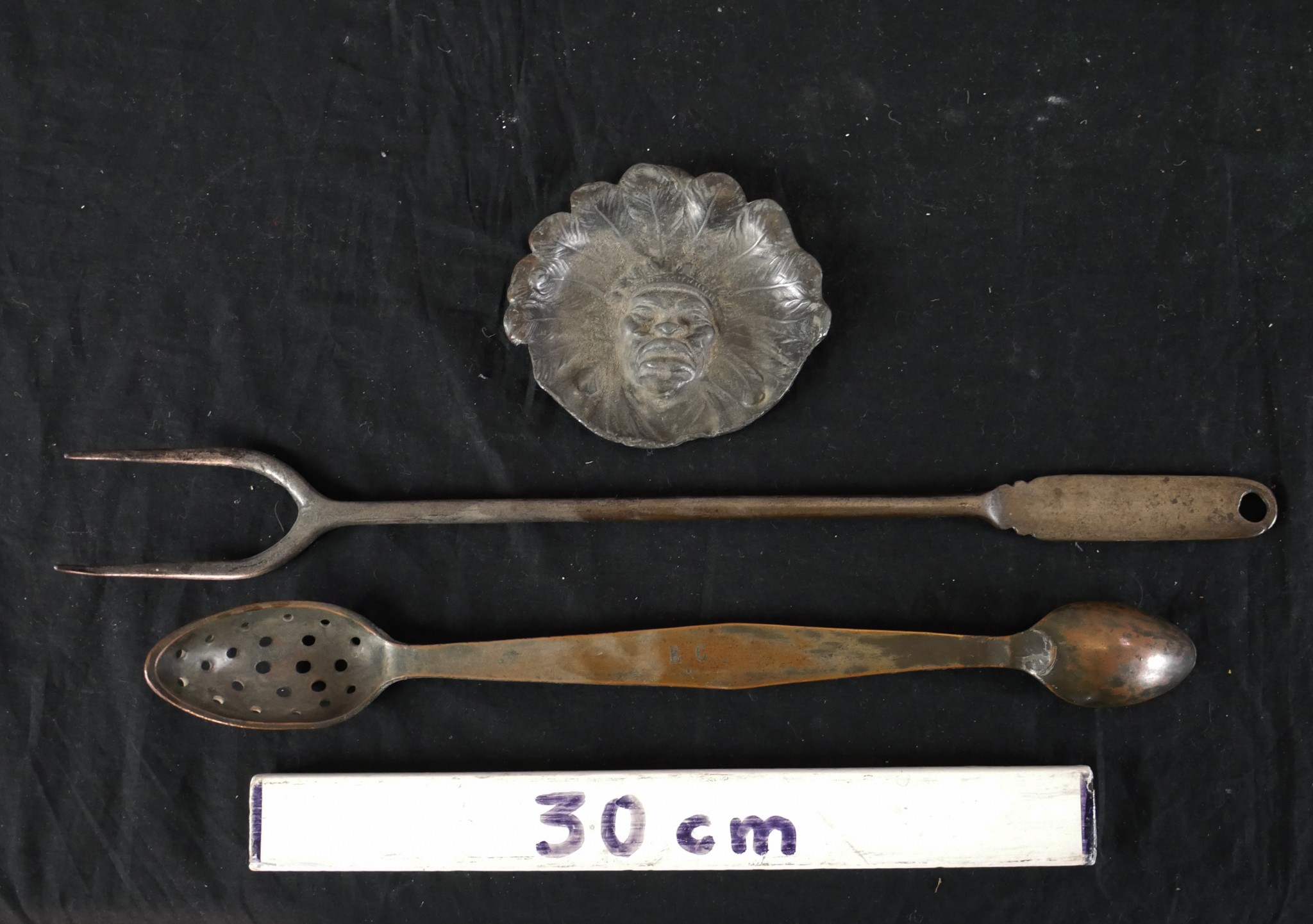 A 19th century silver plated double spoon, a silver plated toasting fork and a brass tray cast in - Image 2 of 3