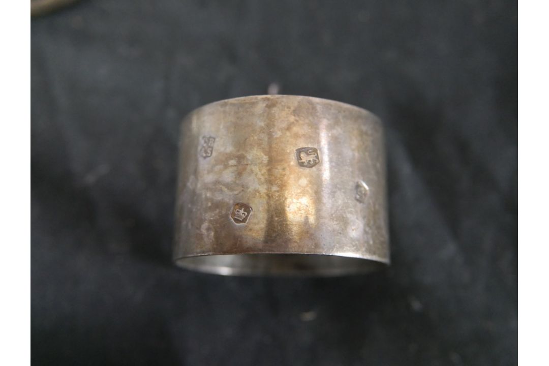 Seven assorted hallmarked silver napkin rings to include Coopers Brothers, Sheffield 1974; Joseph - Image 11 of 11