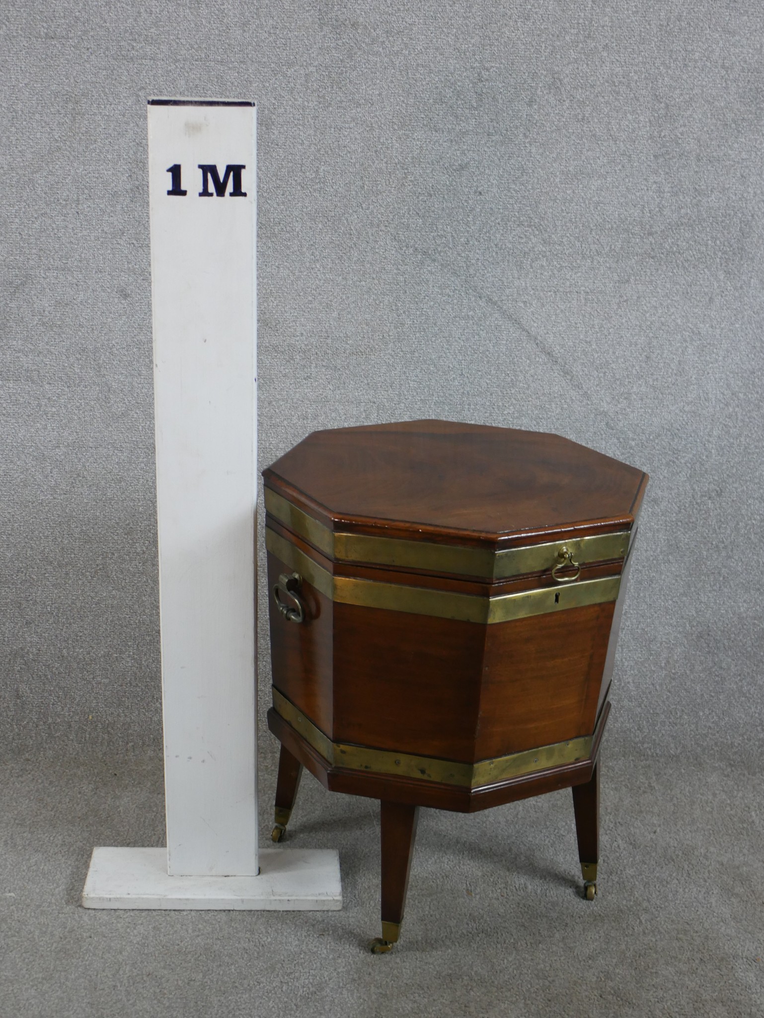 A George III mahogany and brass mounted octagonal wine cooler, raised on tapering supports - Image 5 of 5
