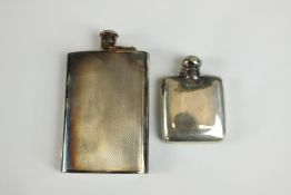 An Elizabeth II hallmarked silver engine turned hipflask, Mappin & Webb Birmingham 1983, 16cm