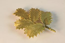 A boxed Floral Danica silver and 24 carat gold plated foliage brooch with secure pin to reverse. L.