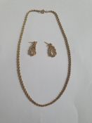 A 9ct gold rope twist chain with secure C-sprung clasp along with a pair of 9ct rope twist chain