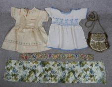 Two 19th century handmade child's dresses together with a gold thread embroidered and various floral