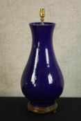 A Chinese, possibly 19th century monochrome pottery pear drop shaped vase converted to a a table