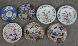 Seven assorted 19th century and later painted stoneware plates to include a pair of Chinese style
