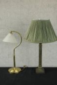 A 20th century brass table lamp, the plain cylindrical column raised on square stepped base together