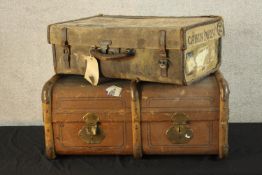 Two early 20th century cloth bound trunks. H.31 W.70 D.48cm. (largest)