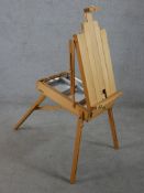 A contemporary beech Dayler Rowney floor standing folding easel raised on splayed supports. H.120