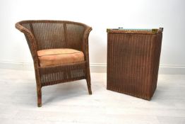 A late 1930s painted Lloyd Loom tub chair with drop in seats, stencil mark Sept. '37 together with