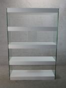 A contemporary large glass open shelving unit. H.183 x W.122 x D.38 cm.