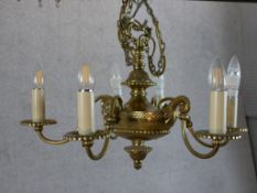 A pair of 19th century French gilded brass six branch hanging electroliers. H.36 W.55 D.55cm