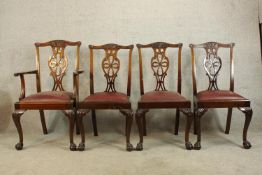 Four 19th century mahogany framed Chippendale style pierced splat single chairs with drop in seats