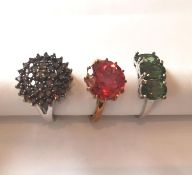 Three 20th century 9 carat gold gem-set rings: a Padparadscha coloured topaz solitaire ring set with