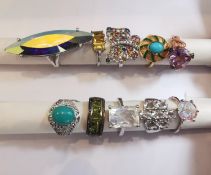 A collection of ten silver and gold plated silver dress rings some set with gemstones, including