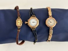 Three 9 carat gold vintage ladies cocktail watches. One with an engraved foliate design bezel and