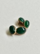 A pair of 9 carat yellow gold and green agate cabochon chain link cufflinks. Stamped 9ct. Gross
