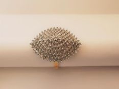 A 9 carat yellow gold and diamond marquise cluster ring. Set with 147 round eight cut diamonds in