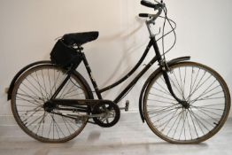 A Raleigh Cameo ladies bicycle. 22