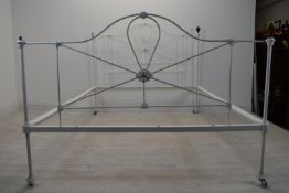 A Victorian style painted metal single bed complete with side irons. H.117.5 W.137 D.198.5cm