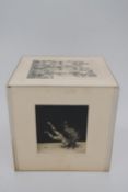 Ted Wilson; a set of six black and white pencil singed prints mounted to form a cube H24 W.23 H.24cm