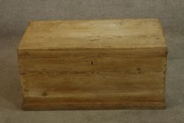 An early 20th century stripped pine twin handled blanket chest raised on plinth base. H.43 W.86cm.