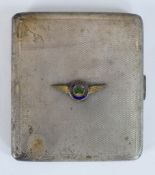 A George V hallmarked silver cigarette case, all over engine turned decoration, with applied