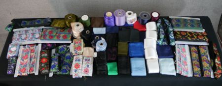 A large collection of Danish embroidered silk folk costume ribbon, different colours, designs and