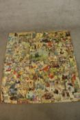 A large scrapscreen collage made from 19th century and later scraps. L.155 W.108cm.