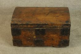 A 19th/early 20th century pine trunk with applied iron work strapwork. H.31 W.57cm.