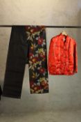 A Chinese red silk embroidered with blossom decoration, together with a Kimono piece embroidered