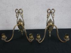 A pair of 19th century brass twin branch wall mounted light fittings (converted to electricity) H.27