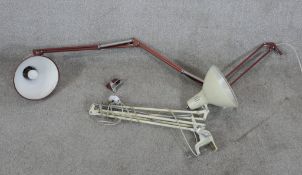 Two anglepoise lamps. The red lamp stamped 'Made in Norway' the other made by 'Thousand and One