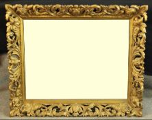 A 19th century carved giltwood Florentine wall mirror. H.81 W.87cm.