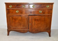 A Georgian style flame mahogany dwarf sideboard. H.102 W.138 D.51 cm.