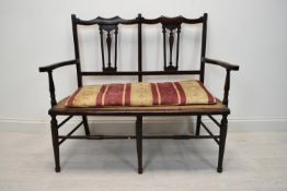 A late 19th century salon sofa. H.94 W.112 D.50 cm.