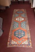 A Kazak runner. L.350 W.99cm.