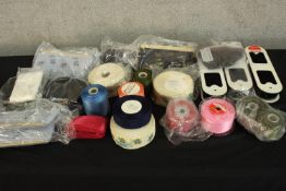 A collection of ribbon and lace. Well preserved and still in manufactures seals. No makers mark